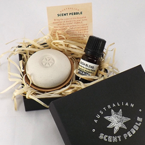 Handmade ceramic pebble with 6ml essential oil blend