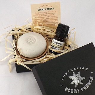 Handmade ceramic pebble with 6ml essential oil blend