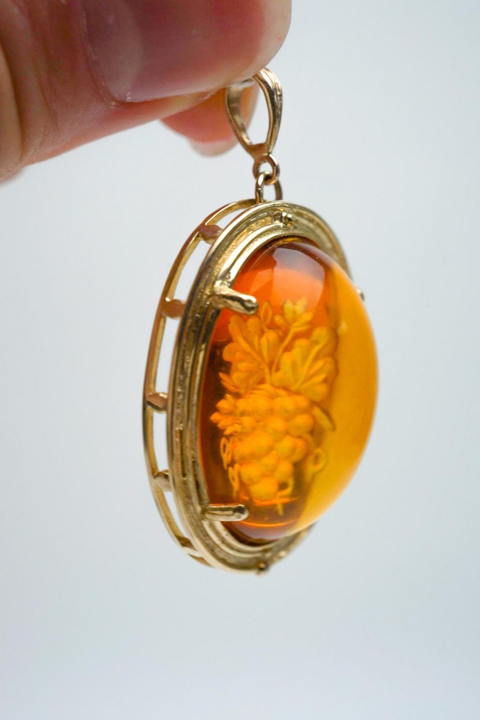 Carved Amber Grape Pendant