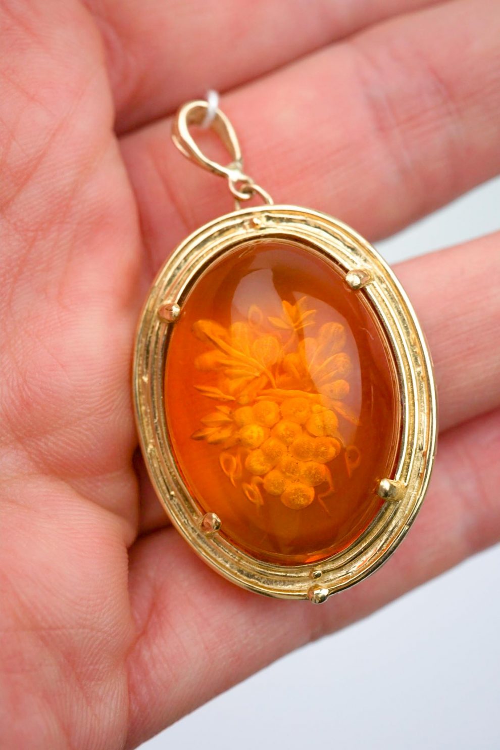 Carved Amber Grape Pendant