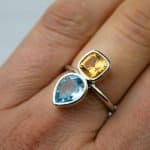 Ring Duo featuring a pear-shaped 9x7mm topaz and 7mm citrine in an elegant handmade setting