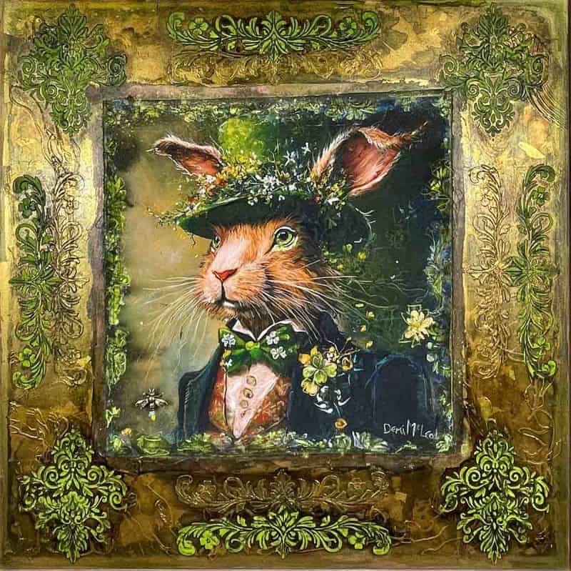 an orginal mixed media artwork by local western australian artist Demi Mcleod featuring a rabbit with a hat on with flowers coming out of the top of the hat. Vibrant gold and green lace around the border.