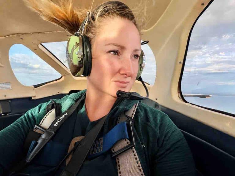 Julie Kenny Aerial Photographer in front passenger seat of plane