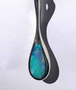 This elegant pendant features a solid Australian opal, hand‑cut and set in sterling silver by Perth jeweller Roger Withers.