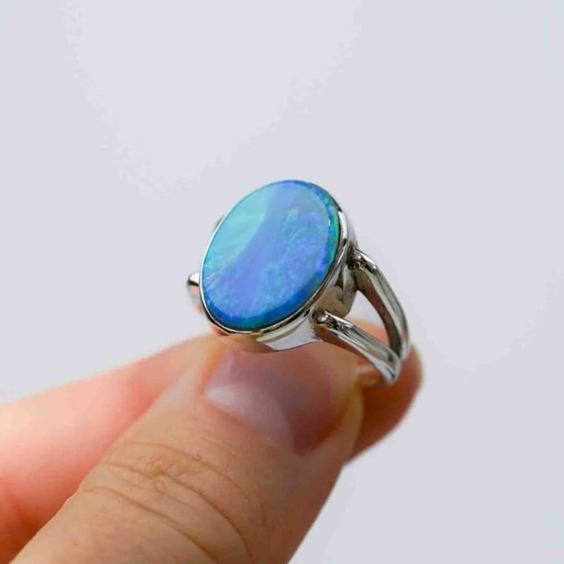 Australian Solid opal ring, oval shaped sterling silver band on a fore finger handcrafted by Roger Withers