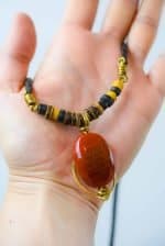 red agate and woven leather necklace pendant Oswaldo Paz. Western Australian Artist. Leather Woven Jewellery.