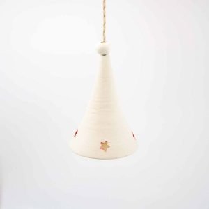 a conical white porcelain bell with four small stars cut from the bottom of the bell with the inside of the cut line painted red