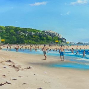A large painting of Cottesloe Beach. The blue waves crash softly on the sand. In the background the foliage covered dunes. In the distance the cranes from Fremantle Harbour can be seen. The beach is very crowded with people sitting in the sand, playing volleyball, and swimming. Lifeguards and their flags can also be seen in the mid-ground.