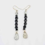 Druzy Agate Earrings (2) The Druzy Agate earrings lay flat on an off-white background.
