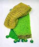 Green knitted scarf with pom poms (1)