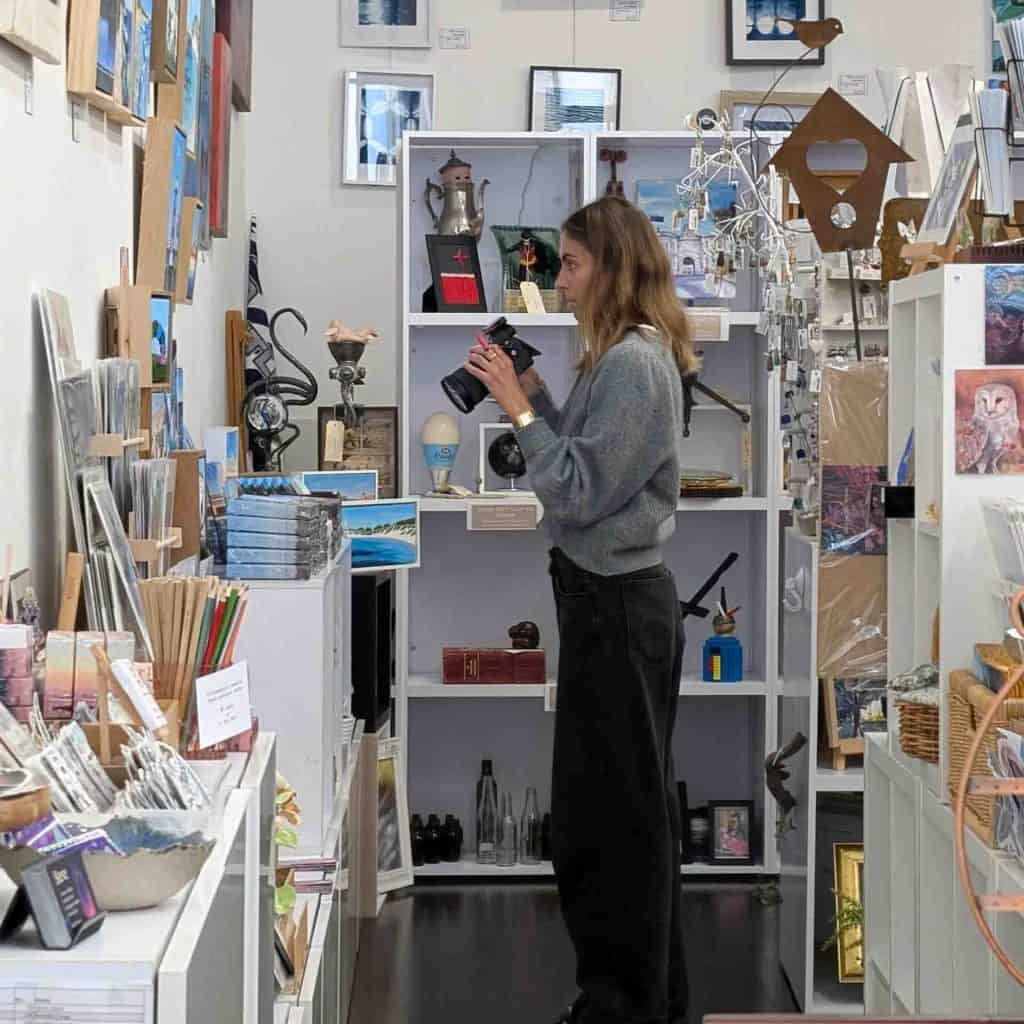 Detail Advertising Videographer taking video at The Artisan Store