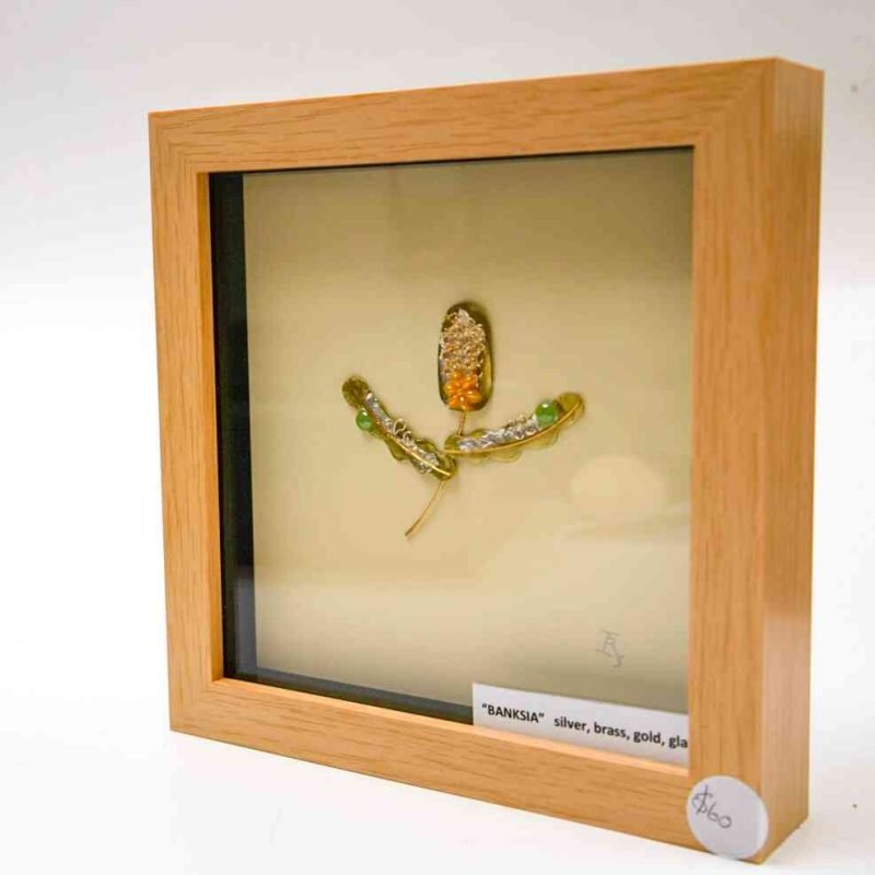 Banksia silver, brass, gold, sculpture in wooden frame (2) A slightly side-on view of the framed banksia sculpture shows the thick frame