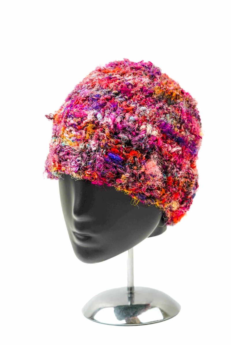 A photo of the knitted beanie on a mannequin head