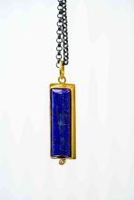 Lapis Lazuli Pendant Felicity Peters (3) The pendant hangs in front of a white background