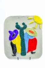 Two Brightly dressed menin sombreros sit below a san pedro cactus and a shining sun on this rectangular piece of decorative stoneware